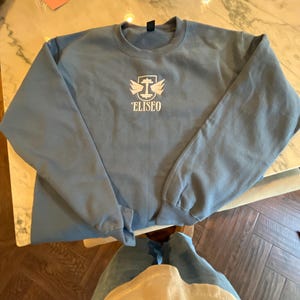 Ezra added a photo of their purchase