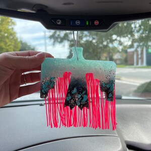 Ashley added a photo of their purchase
