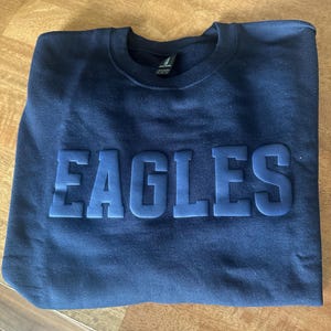 Nicole added a photo of their purchase