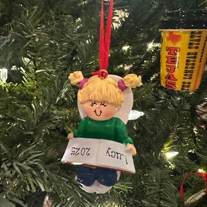 Kayla added a photo of their purchase