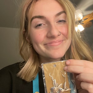Holly added a photo of their purchase