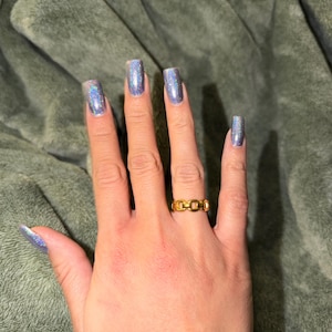 Maddie added a photo of their purchase