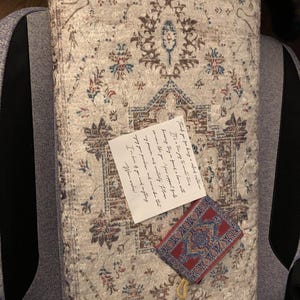 Natasha added a photo of their purchase
