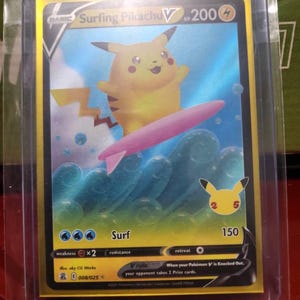 is the surfing pikachu card rare Surfing Pikachu V Rare Pokemon Card Celebrations | Real Authentic
