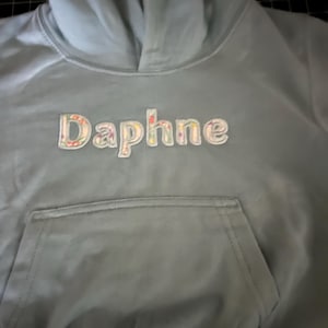 Liz added a photo of their purchase