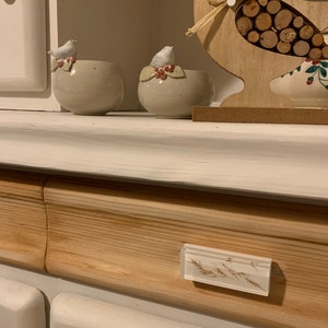 Didine added a photo of their purchase