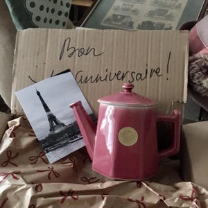 Aya added a photo of their purchase