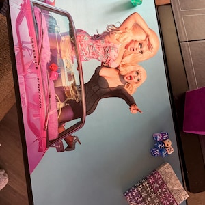 Ashley added a photo of their purchase