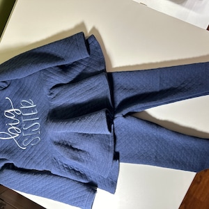 Joan added a photo of their purchase