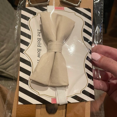 champagne colored bow tie and suspenders