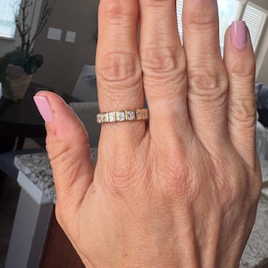 Denise added a photo of their purchase