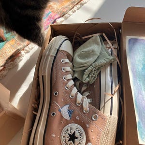 M.I.A added a photo of their purchase