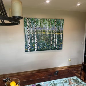 Gina added a photo of their purchase