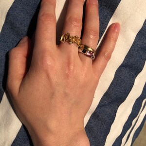 Taylor added a photo of their purchase