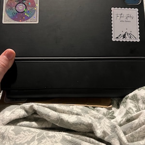 Nicola added a photo of their purchase