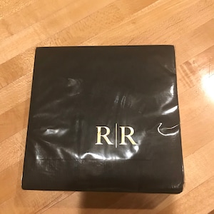 Gina added a photo of their purchase