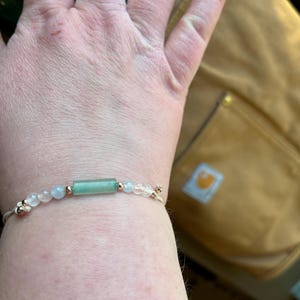 Angela added a photo of their purchase