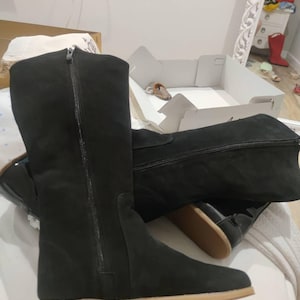 Zulema added a photo of their purchase