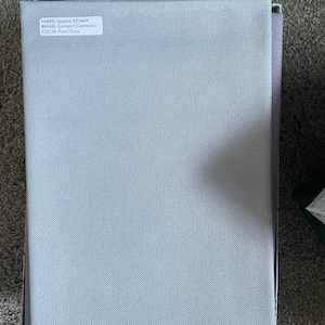 Alexandra added a photo of their purchase
