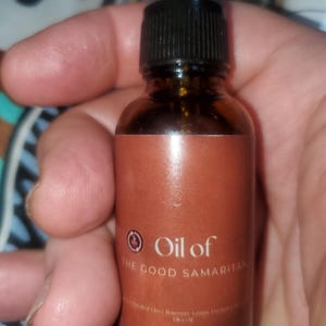 Ideal Products -Olio del Buon Samaritano. Formula Luz de Maria. Una miscela di vari oli essenziali Chiodi di Garofano, Limone, Rosmarino, Eucalipto e Cannella. 30 ml (1,02 oz). 100% Naturale