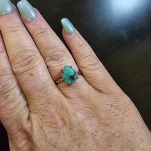 Aileen added a photo of their purchase