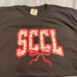 Carrie added a photo of their purchase