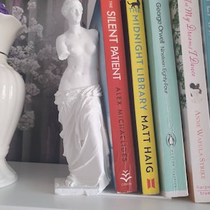 Laura added a photo of their purchase