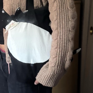 Bella added a photo of their purchase