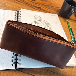 Leonard added a photo of their purchase