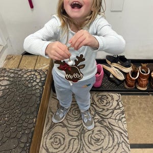 Nikki added a photo of their purchase