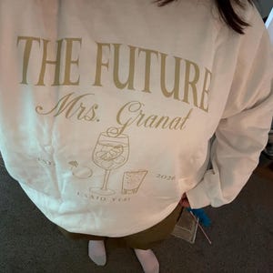 Natalie added a photo of their purchase