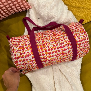 Samantha added a photo of their purchase