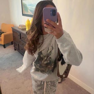 Elaina added a photo of their purchase