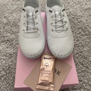 Irina added a photo of their purchase