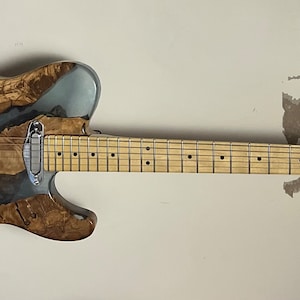 Tom added a photo of their purchase