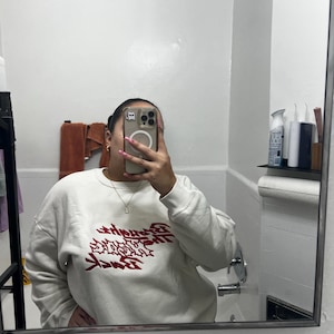 Tatiana added a photo of their purchase