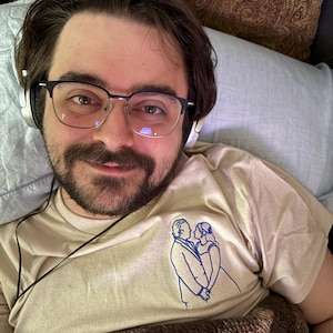 Sam added a photo of their purchase