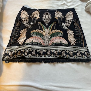 Isabella added a photo of their purchase