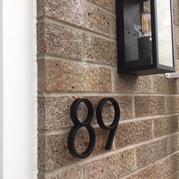 black-floating-house-numbers-black-metal-house-numbers-floating-door