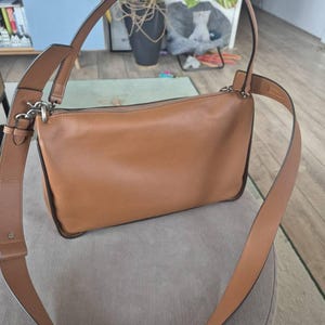 Sasha added a photo of their purchase