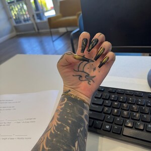 Rhiannon added a photo of their purchase