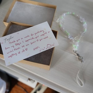 Taylor added a photo of their purchase
