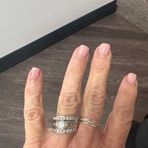 Lynette added a photo of their purchase