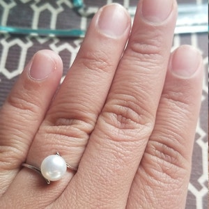 Beatriz added a photo of their purchase