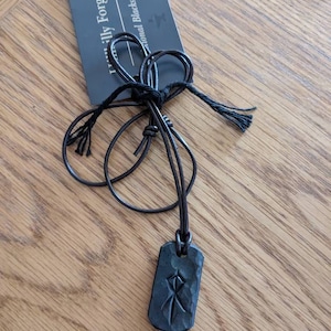 Neville added a photo of their purchase
