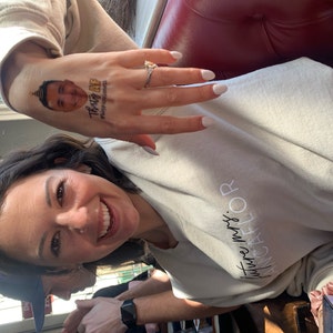 Alyssa added a photo of their purchase