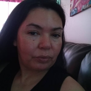 Gloria added a photo of their purchase