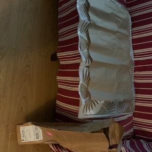 Alisha added a photo of their purchase