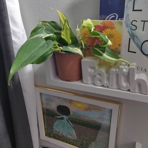 Felicia Corbette added a photo of their purchase