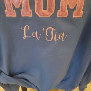 LaTia added a photo of their purchase